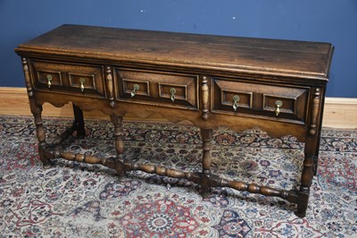 Lot 154 - An 18th century style oak dresser base with...