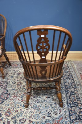 Lot 21 - Three elm seated wheel back Windsor elbow...