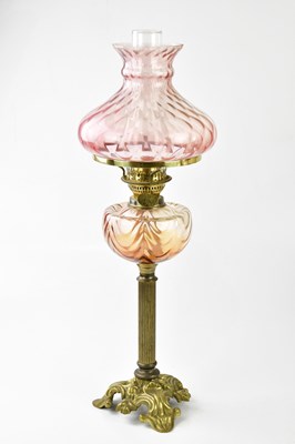 Lot 384 - A decorative 20th century oil lamp with...