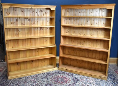 Lot 164 - A pair of modern pine waterfall bookcases with...