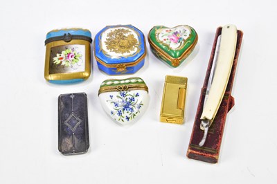 Lot 315 - Four porcelain trinket boxes including a hand...