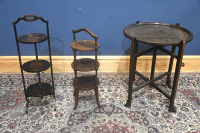 Lot 95 - An Edwardian inlaid mahogany three tier cake...