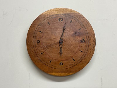 Lot 393 - A contemporary light oak wall clock, diameter...