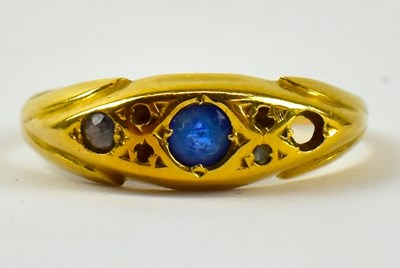 Lot 810 - An 18ct yellow gold diamond and sapphire set...