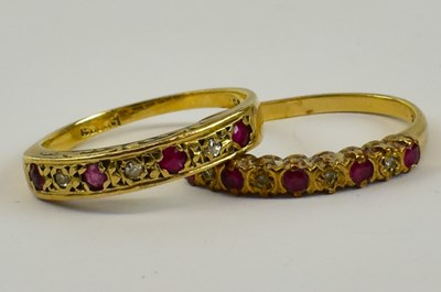 Lot 820 - A 9ct yellow gold ruby and diamond ring set...