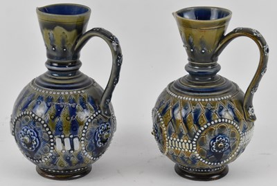 Lot 517 - DOULTON LAMBETH; a pair of 19th century jugs,...