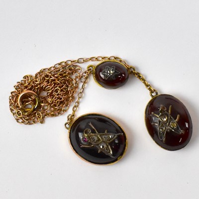 Lot 805 - An Edwardian yellow metal necklace suspending...