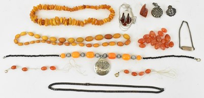 Lot 852 - A group of silver and amber set jewellery...