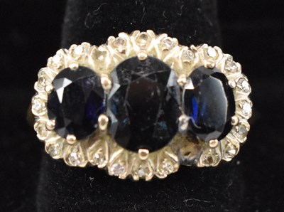 Lot 789 - An 18ct yellow gold sapphire and diamond...