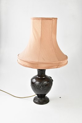 Lot 1269 - A Japanese Meiji period bronze table lamp,...