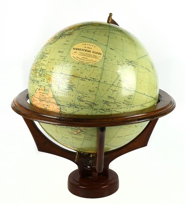 Lot 18 - PHILLIPS; a 19” terrestrial globe on a wooden...