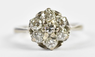 Lot 71 - An 18ct white gold seven stone diamond...