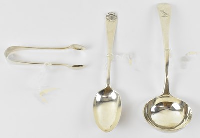 Lot 720 - A George III hallmarked silver soup ladle,...