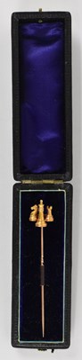 Lot 839 - CHESS INTEREST; a yellow metal tie pin, the...