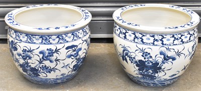 Lot 518 - A pair of modern blue and white painted...