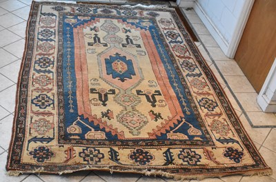 Lot 117 - A large Aberjan cream ground rug with...