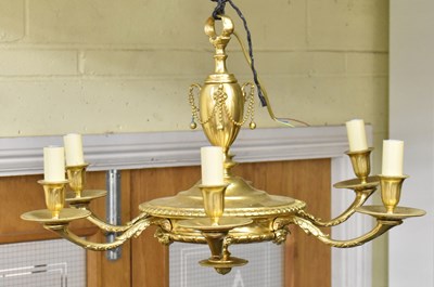 Lot 132 - A modern French style brass six branch...