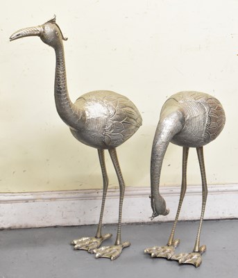 Lot 450 - A pair of contemporary silvered models of...