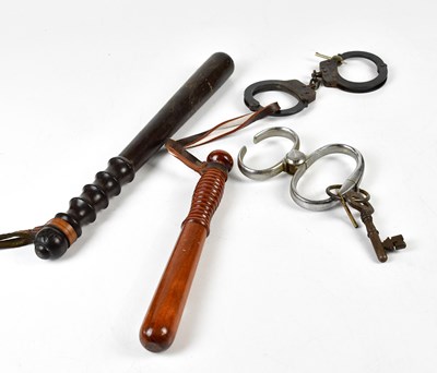 Lot 278 - Two vintage policemen's truncheons and two...