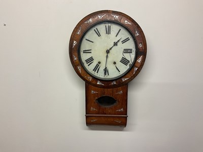 Lot 394 - A wall mounted clock, diameter 30cm, height 72cm.