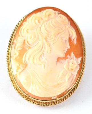 Lot 822 - A shell cameo brooch in a 9ct gold mount, with...