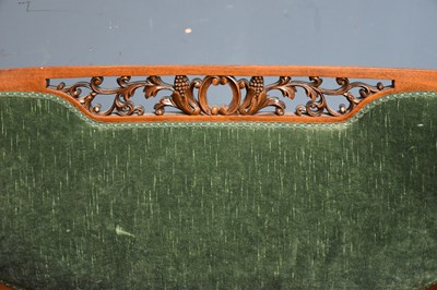 Lot 32 - An Edwardian carved mahogany two seater settee...