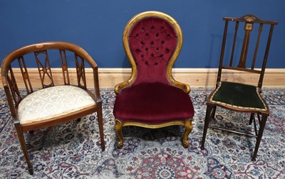 Lot 82 - A reproduction spoon back nursing chair, an...