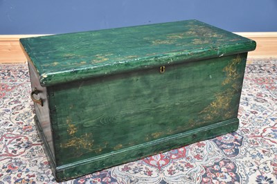 Lot 176 - A green painted pine blanket chest, with gilt...