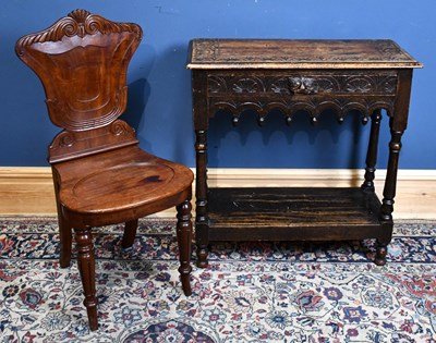 Lot 80 - A 1920s carved oak side table in the Flemish...