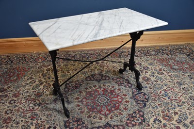 Lot 196 - A cast metal garden table with rectangular...