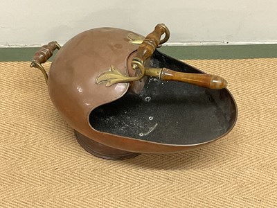 Lot 276 - A Victorian copper coal scuttle with wooden...