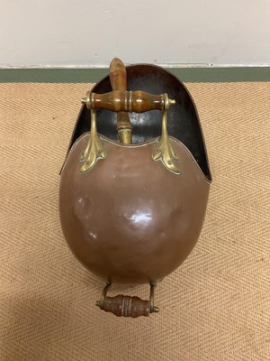 Lot 276 - A Victorian copper coal scuttle with wooden...