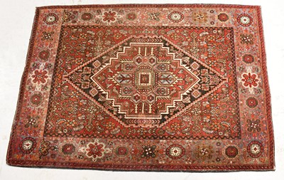 Lot 98 - A Gholtogh Persian wool rug, with central...