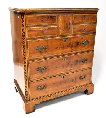 Lot 28 - A Georgian-style yew wood open backed cabinet...