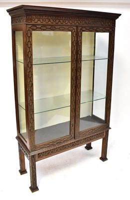 Lot 30 - A Chippendale-style mahogany display cabinet...