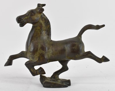 Lot 676 - A modern bronze sculpture of a prancing horse,...