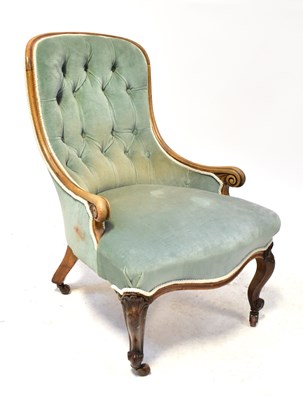 Lot 56 - A Victorian walnut nursing chair, button...