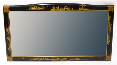 Lot 82 - A mid-20th century japanned wall mirror with...