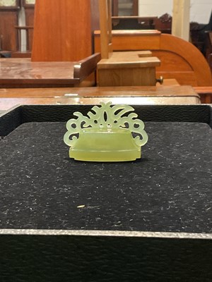 Lot 401 - A Chinese carved jade Bi disc, the front with...
