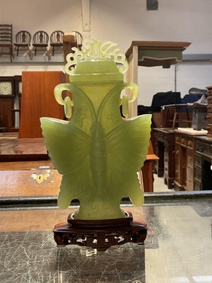Lot 401 - A Chinese carved jade Bi disc, the front with...