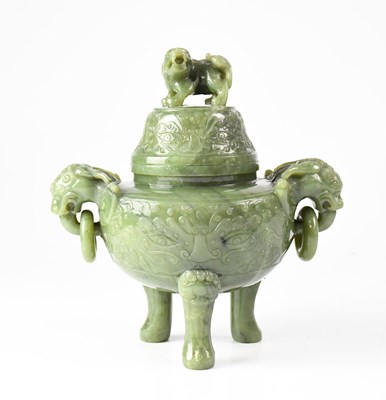 Lot 403 - A large Chinese carved mottled jade koro and...