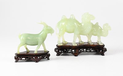 Lot 389 - A Chinese carved jade figure group of two...