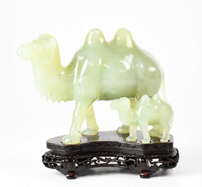 Lot 386 - A Chinese carving depicting two camels,...