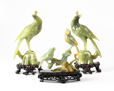 Lot 383 - Three Chinese bird carvings, each on shaped...