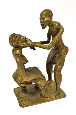 Lot 437 - An African bronze figure of a dentist...