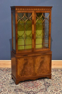 Lot 187 - A reproduction mahogany bookcase, the upper...