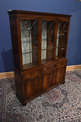 Lot 178 - A reproduction mahogany bookcase, the top...