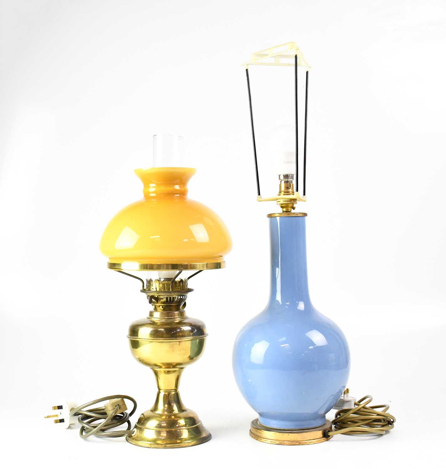 Lot 108 - A reproduction oil lamp with mustard-coloured...