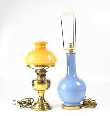 Lot 108 - A reproduction oil lamp with mustard-coloured...