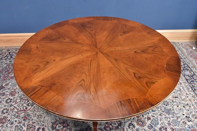 Lot 6 - A reproduction walnut and rosewood tilt-top...